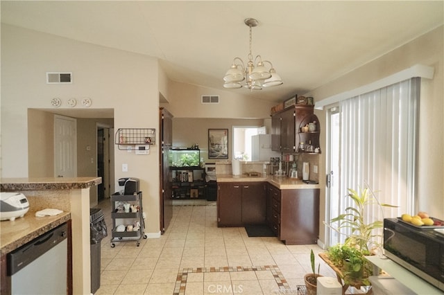 310 Buena Vista Ct, Merced, CA 95348 - kitchen featuring vaulted ceiling, dark brown cabinets, black microwave, light countertops, and a chandelier