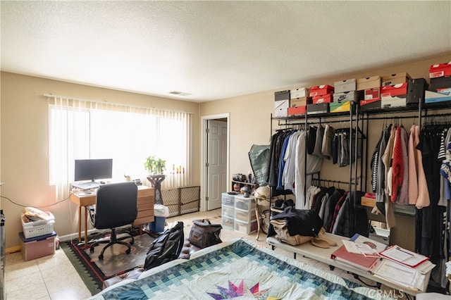 310 Buena Vista Ct, Merced, CA 95348 - bedroom featuring an office area and a textured ceiling