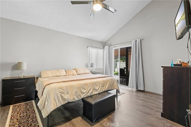4856 W Glen Abbey Way, Banning, CA 92220 - bedroom with access to outside, wood finished floors, a textured ceiling, a ceiling fan, and high vaulted ceiling