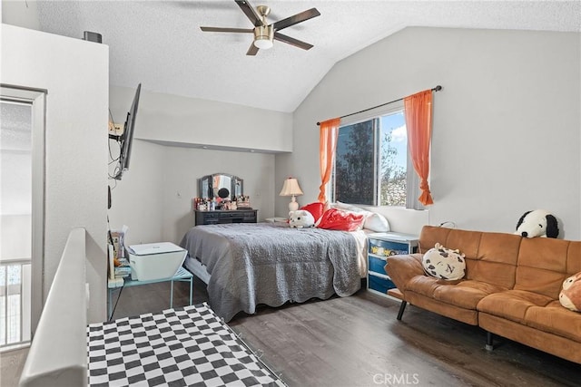 4856 W Glen Abbey Way, Banning, CA 92220 - bedroom with multiple windows, wood finished floors, vaulted ceiling, a textured ceiling, and a ceiling fan