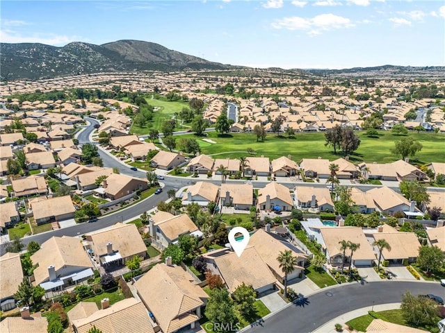 4856 W Glen Abbey Way, Banning, CA 92220 - aerial view of residential area featuring a mountain backdrop and a local golf course