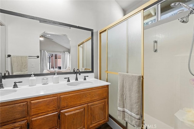 4856 W Glen Abbey Way, Banning, CA 92220 - full bath with a shower stall, double vanity, and lofted ceiling