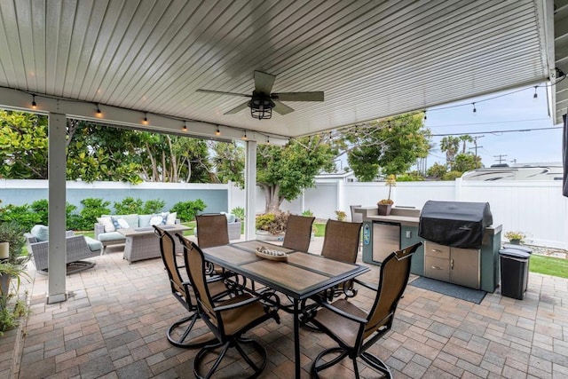 3696 Ben St, San Diego, CA 92111 - fenced backyard with an outdoor hangout area, a patio area, outdoor dining space, and grilling area