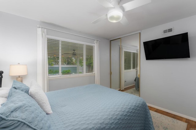 3696 Ben St, San Diego, CA 92111 - bedroom with wood finished floors, baseboards, a ceiling fan, and a closet