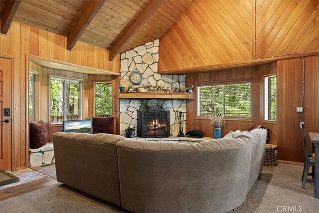 267 Pioneer Rd, Lake Arrowhead, CA 92317 - living room with wood ceiling, a stone fireplace, and wooden walls