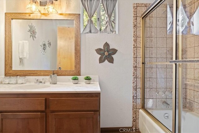 267 Pioneer Rd, Lake Arrowhead, CA 92317 - bathroom with vanity, enclosed tub / shower combo, and a textured wall