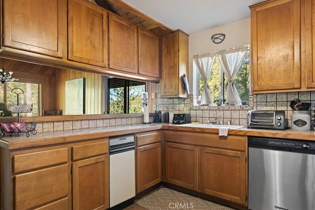 267 Pioneer Rd, Lake Arrowhead, CA 92317 - kitchen featuring dishwasher, tasteful backsplash, tile countertops, and brown cabinets