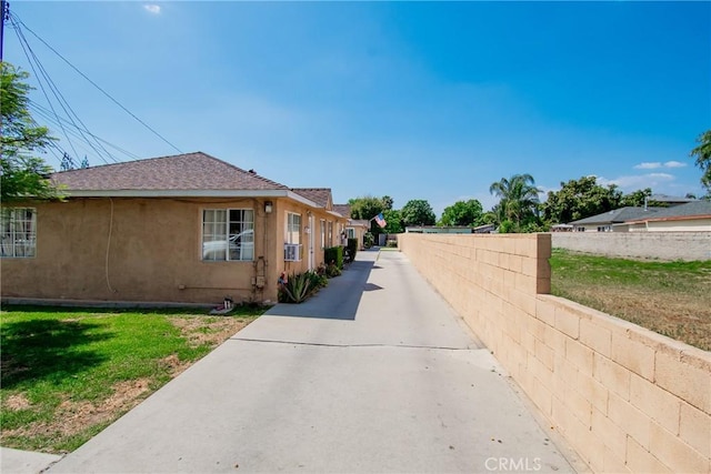 2743 Cogswell Rd, El Monte, CA 91732 - view of property exterior with stucco siding and a shingled roof