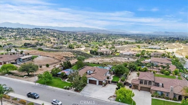 aerial perspective of suburban area featuring mountains