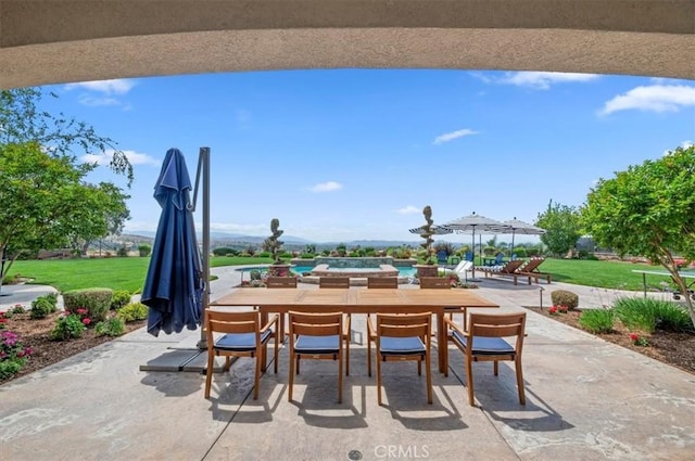 view of patio featuring outdoor dining space