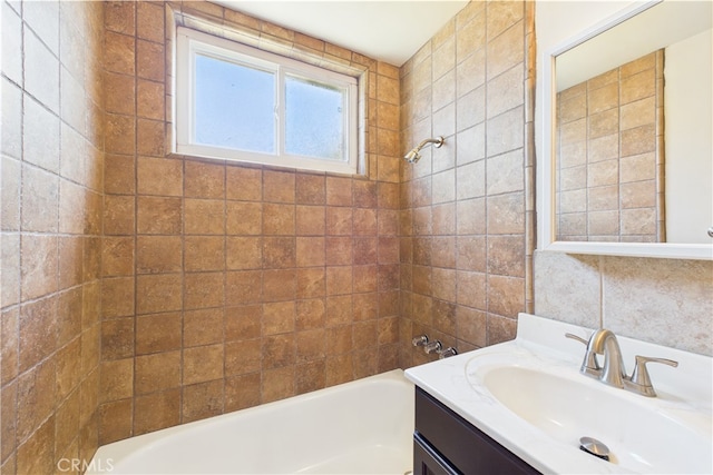 bathroom featuring vanity and shower / washtub combination
