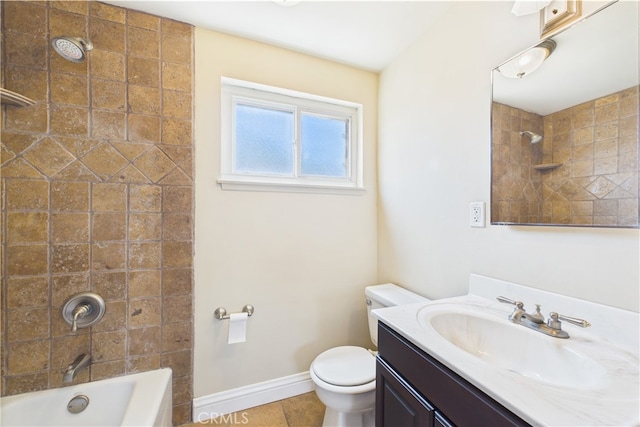 full bath with toilet, tile patterned floors, vanity, baseboards, and shower / bathtub combination
