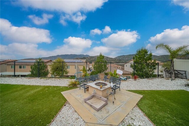 3344 Pokeroot Ln, San Bernardino, CA 92407 - view of yard with a fire pit, a patio area, and a mountain view