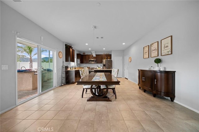 3344 Pokeroot Ln, San Bernardino, CA 92407 - dining room with baseboards and recessed lighting
