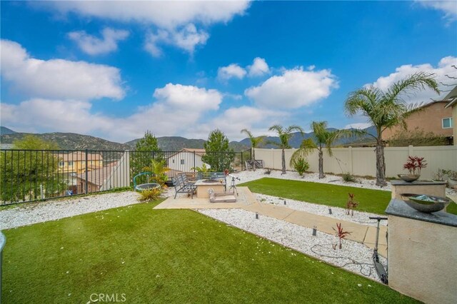 3344 Pokeroot Ln, San Bernardino, CA 92407 - view of yard with a patio and a mountain view