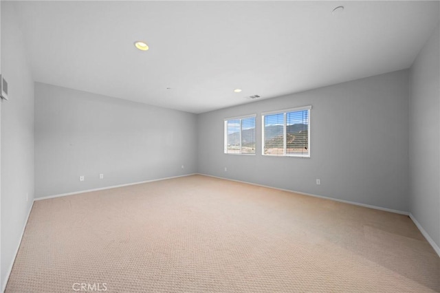 3344 Pokeroot Ln, San Bernardino, CA 92407 - unfurnished room featuring light colored carpet, baseboards, and recessed lighting
