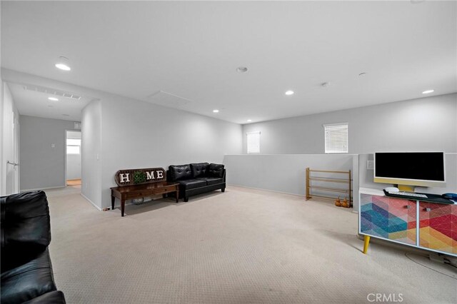3344 Pokeroot Ln, San Bernardino, CA 92407 - living area with carpet flooring, healthy amount of natural light, recessed lighting, and baseboards