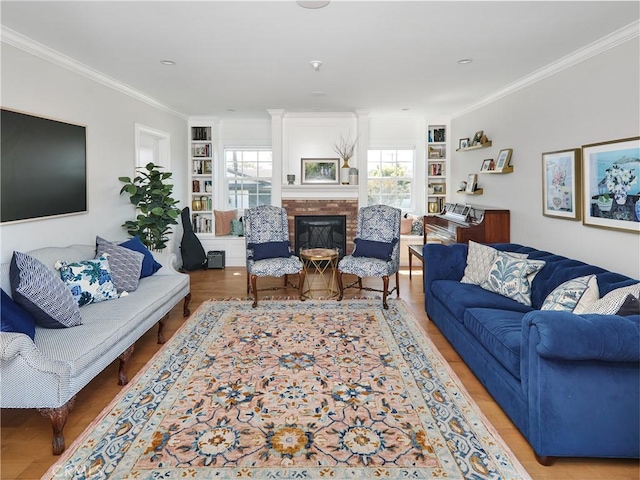 6443 W 81st St, Los Angeles, CA 90045 - living area featuring built in features, ornamental molding, a fireplace, and wood finished floors