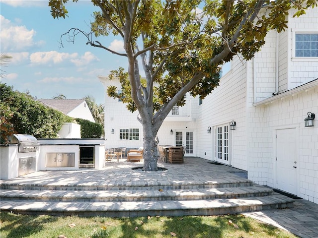 6443 W 81st St, Los Angeles, CA 90045 - rear view of property featuring french doors, exterior kitchen, wine cooler, and a patio area