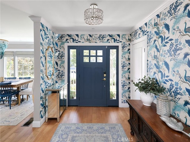 6443 W 81st St, Los Angeles, CA 90045 - entrance foyer featuring light wood-style floors, wallpapered walls, a chandelier, and ornamental molding