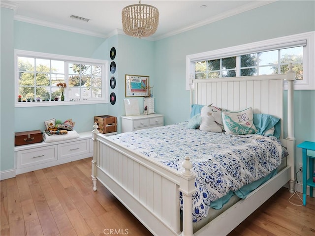 6443 W 81st St, Los Angeles, CA 90045 - bedroom featuring light wood-style floors, a chandelier, and crown molding