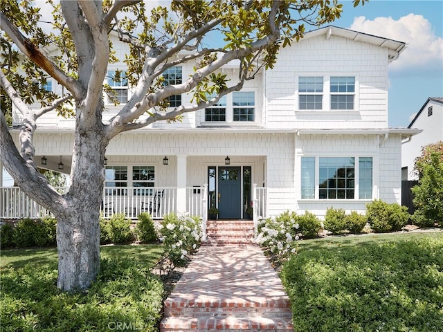 6443 W 81st St, Los Angeles, CA 90045 - view of front of home featuring a porch and a front yard