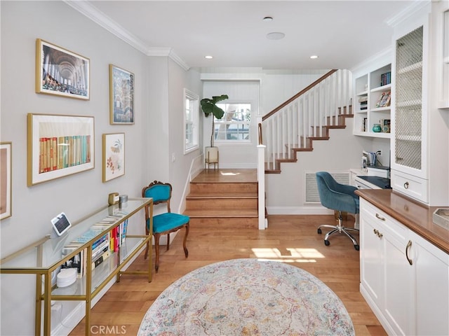 6443 W 81st St, Los Angeles, CA 90045 - home office with light wood-style flooring, ornamental molding, built in desk, baseboards, and recessed lighting