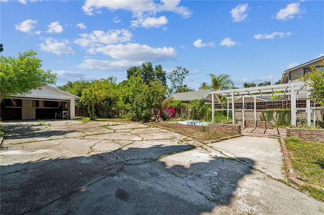 view of yard with an exterior structure and an outdoor structure