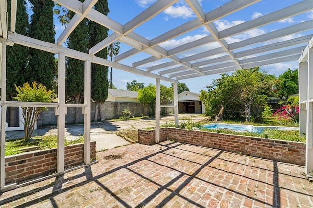 fenced backyard featuring a pergola, a patio, and an outdoor structure