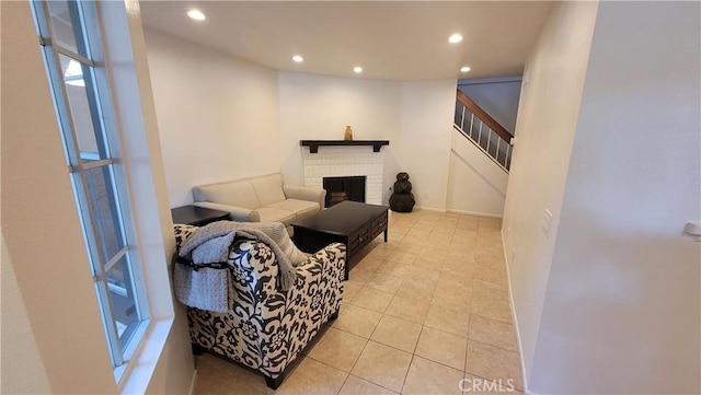 2364 S Cutty Way Unit 3, Anaheim, CA 92802 - living area featuring recessed lighting, stairway, light tile patterned flooring, and a brick fireplace