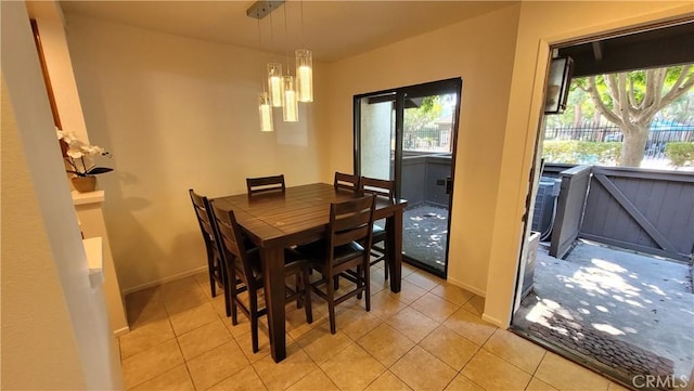 2364 S Cutty Way Unit 3, Anaheim, CA 92802 - dining area with light tile patterned flooring and a chandelier