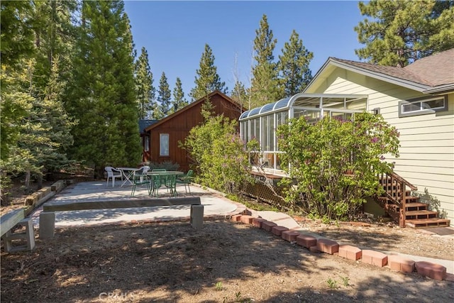 919 S Waldstrasse Way, Big Bear Lake, CA 92314 - view of yard featuring a patio and a lanai