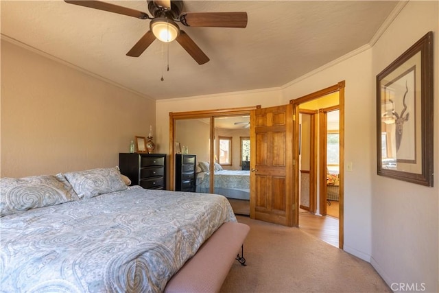 919 S Waldstrasse Way, Big Bear Lake, CA 92314 - bedroom with light carpet, a closet, ornamental molding, and ceiling fan