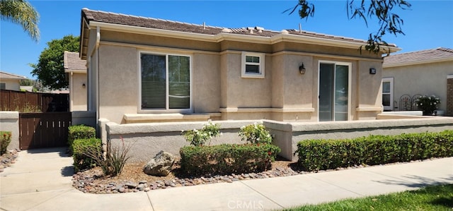 8281 Triplett Ln, Hemet, CA 92545 - view of front of property featuring a fenced front yard and stucco siding
