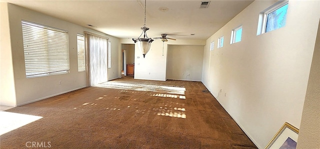 8281 Triplett Ln, Hemet, CA 92545 - unfurnished dining area featuring ceiling fan and carpet flooring