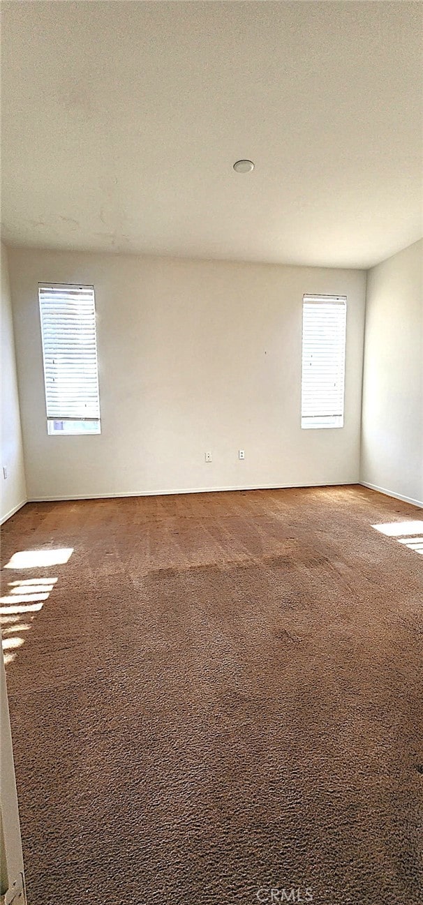 8281 Triplett Ln, Hemet, CA 92545 - carpeted spare room with plenty of natural light