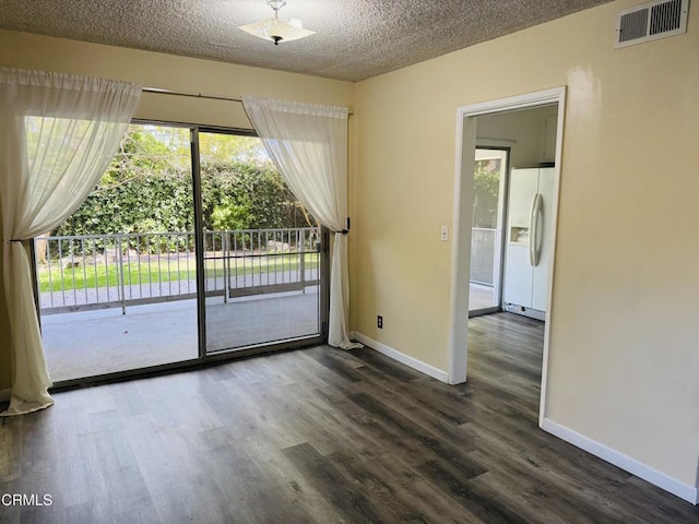 1810 Ramona Ave Unit 15, South Pasadena, CA 91030 - unfurnished room with dark wood-style flooring and a textured ceiling