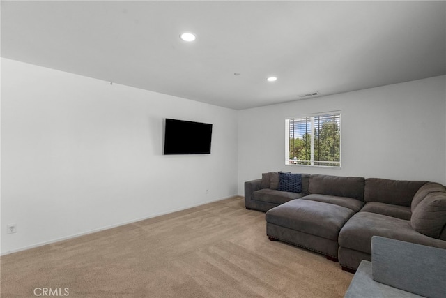 1021 Cambridge Ct, Lancaster, CA 93535 - living area featuring light colored carpet, recessed lighting, and baseboards
