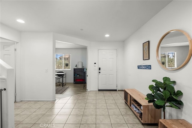 1021 Cambridge Ct, Lancaster, CA 93535 - entryway with recessed lighting, light tile patterned floors, and baseboards