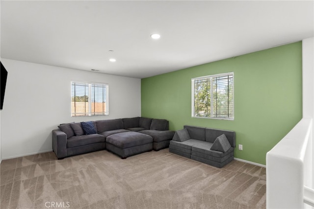 1021 Cambridge Ct, Lancaster, CA 93535 - living area featuring light carpet, recessed lighting, and baseboards