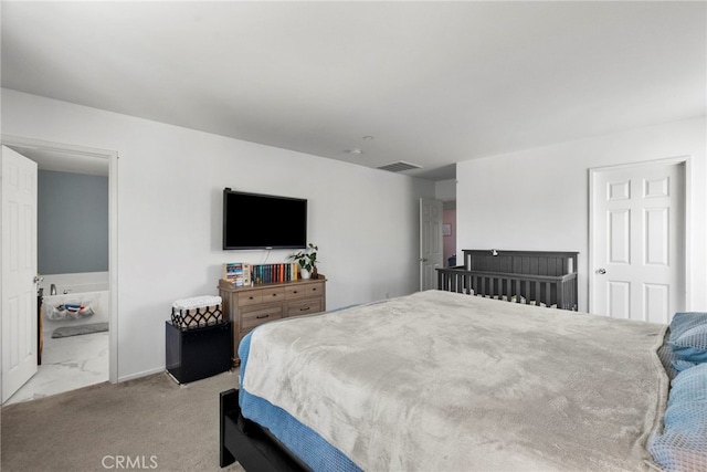 1021 Cambridge Ct, Lancaster, CA 93535 - bedroom with baseboards and connected bathroom