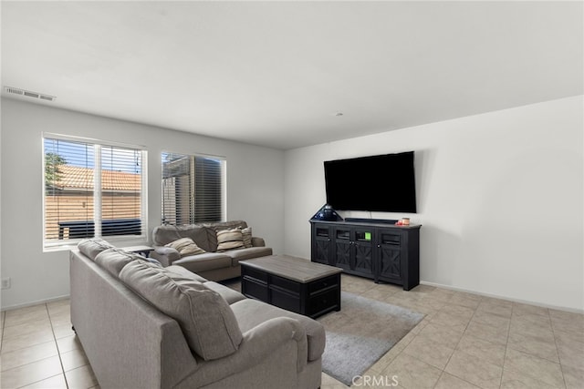 1021 Cambridge Ct, Lancaster, CA 93535 - living area with light tile patterned floors and baseboards