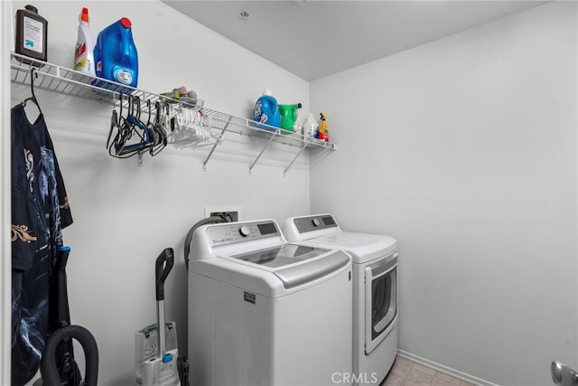 1021 Cambridge Ct, Lancaster, CA 93535 - laundry area with independent washer and dryer and baseboards