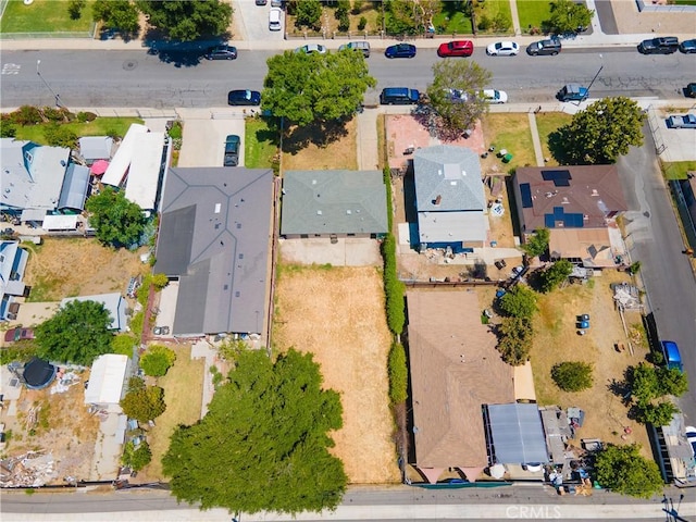aerial view of property's location featuring nearby suburban area