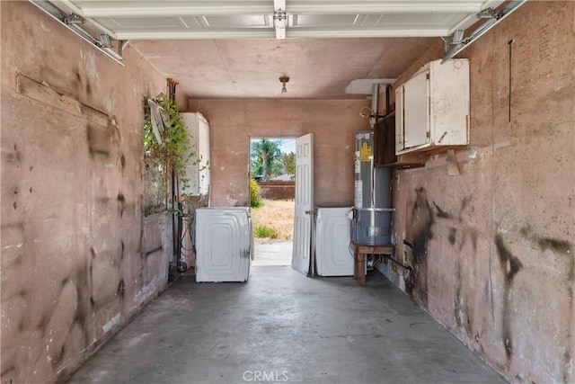 garage with gas water heater and water heater