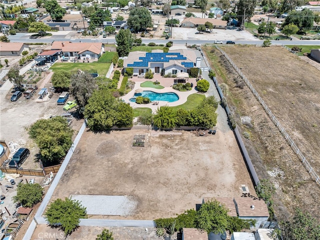 aerial view of residential area with a pool