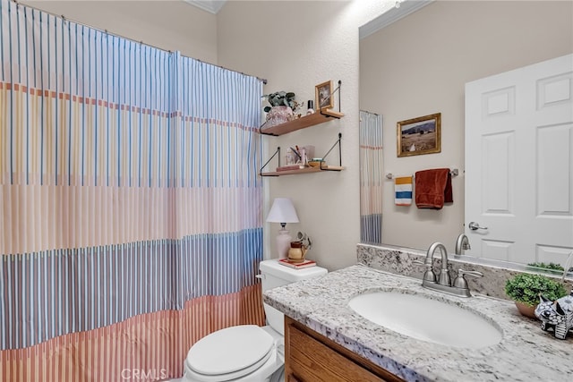full bathroom with toilet, vanity, a shower with shower curtain, and ornamental molding