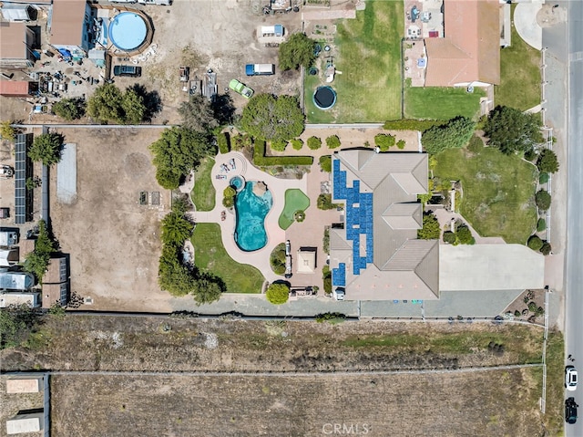 aerial view of property's location with a pool