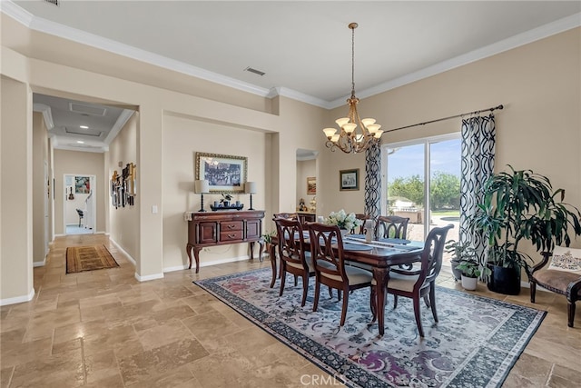 dining room featuring ornamental molding, stone tile floors, a chandelier, and baseboards