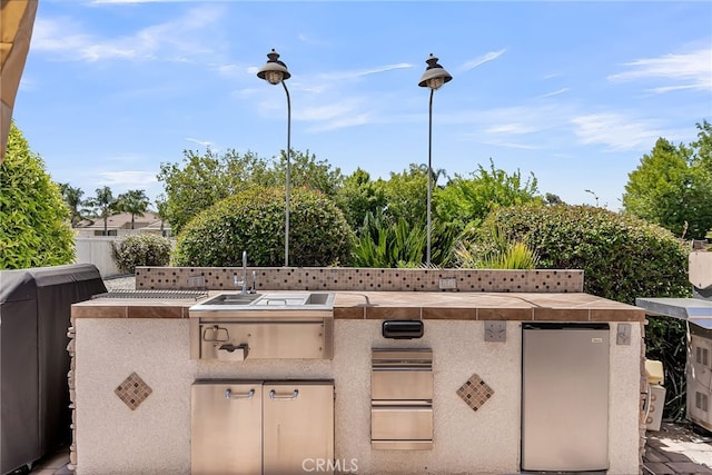 view of patio featuring a sink